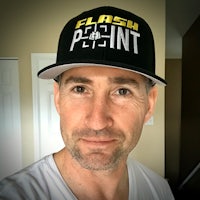 a man wearing a hat that says flash point